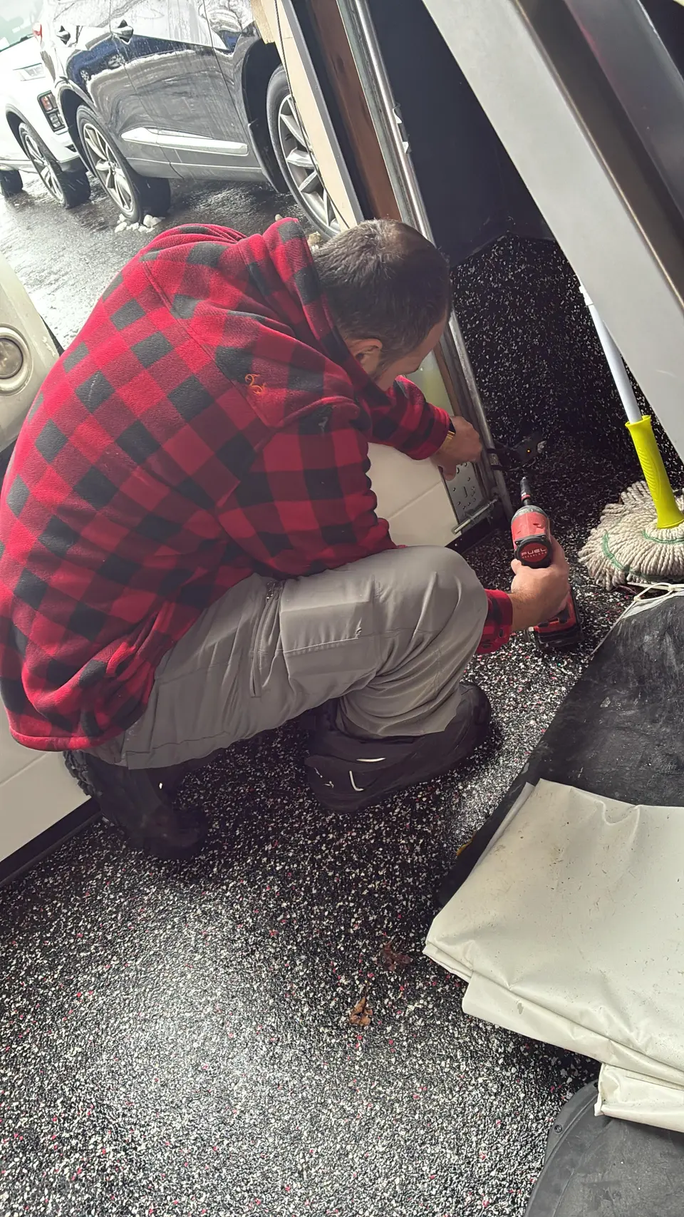 Jacob completing a garage door repair